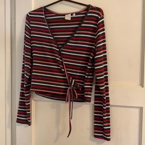 Super cute multi color long sleeve. Has a little tie in the front which i loved!